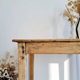 Antique farmhouse table in raw wood