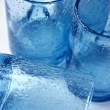 Four Biot glass mugs blue bubbled glass