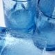 Four Biot glass mugs blue bubbled glass