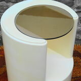 Cylindrical fiberglass bedside table from the 60s