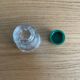 Vintage salt shaker with green Bakelite cap