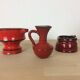 3 red ceramic vases