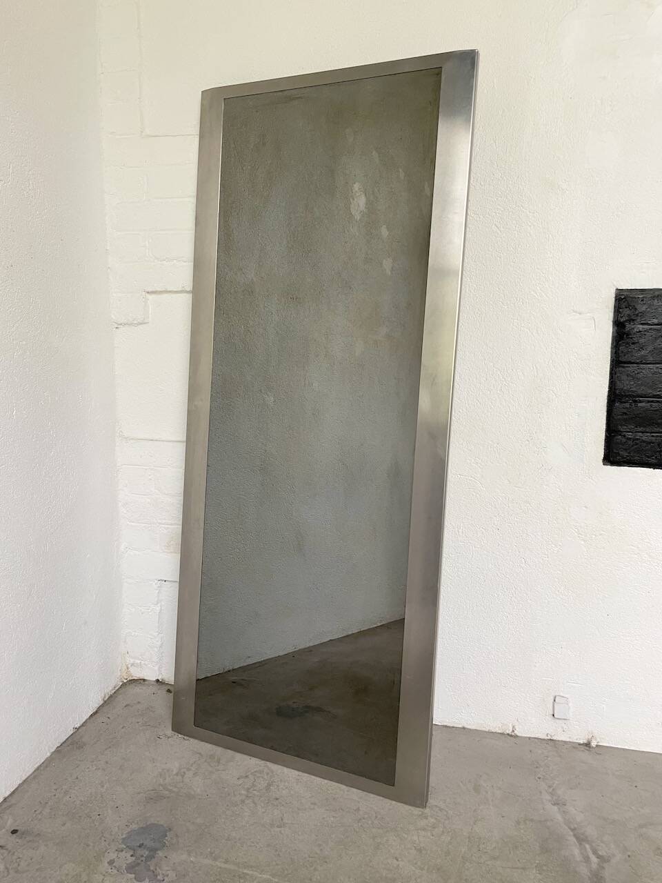 Brushed stainless steel mirror circa François Monnet and Joelle Ferlande