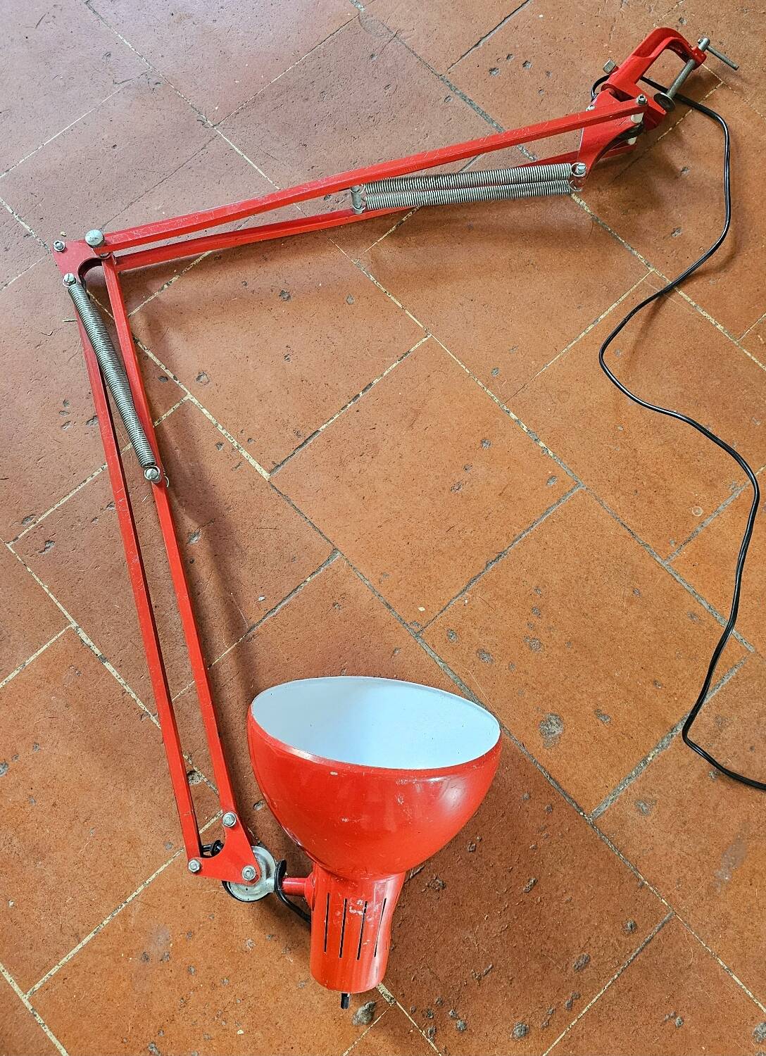 Red articulated workshop lamp