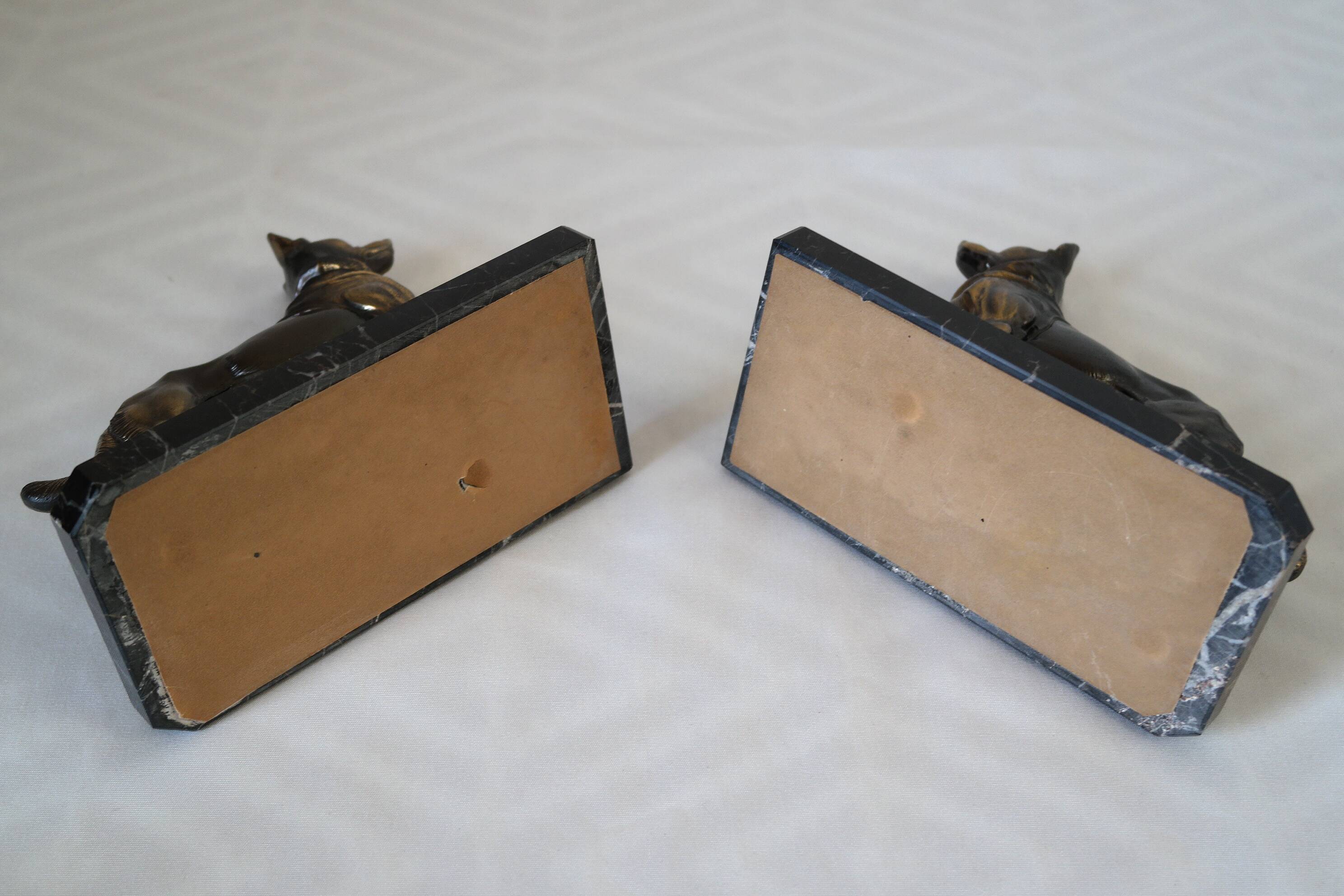 Dog bookends in black marble