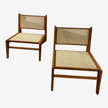 Pair of teak and canning armchairs