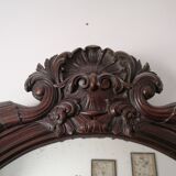 Miroir en bois sculpté
