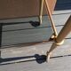 Smoked glass and brass dessert table