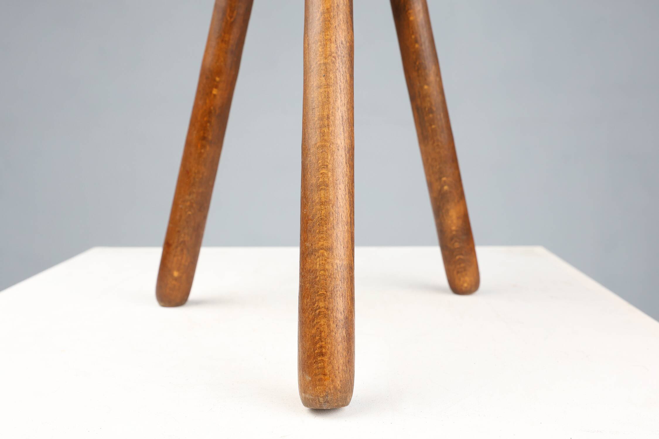 French hand crafted brutalist rustic low tripod stool in solid wood