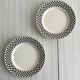Pair of vintage plates with a black and white checkered pattern.