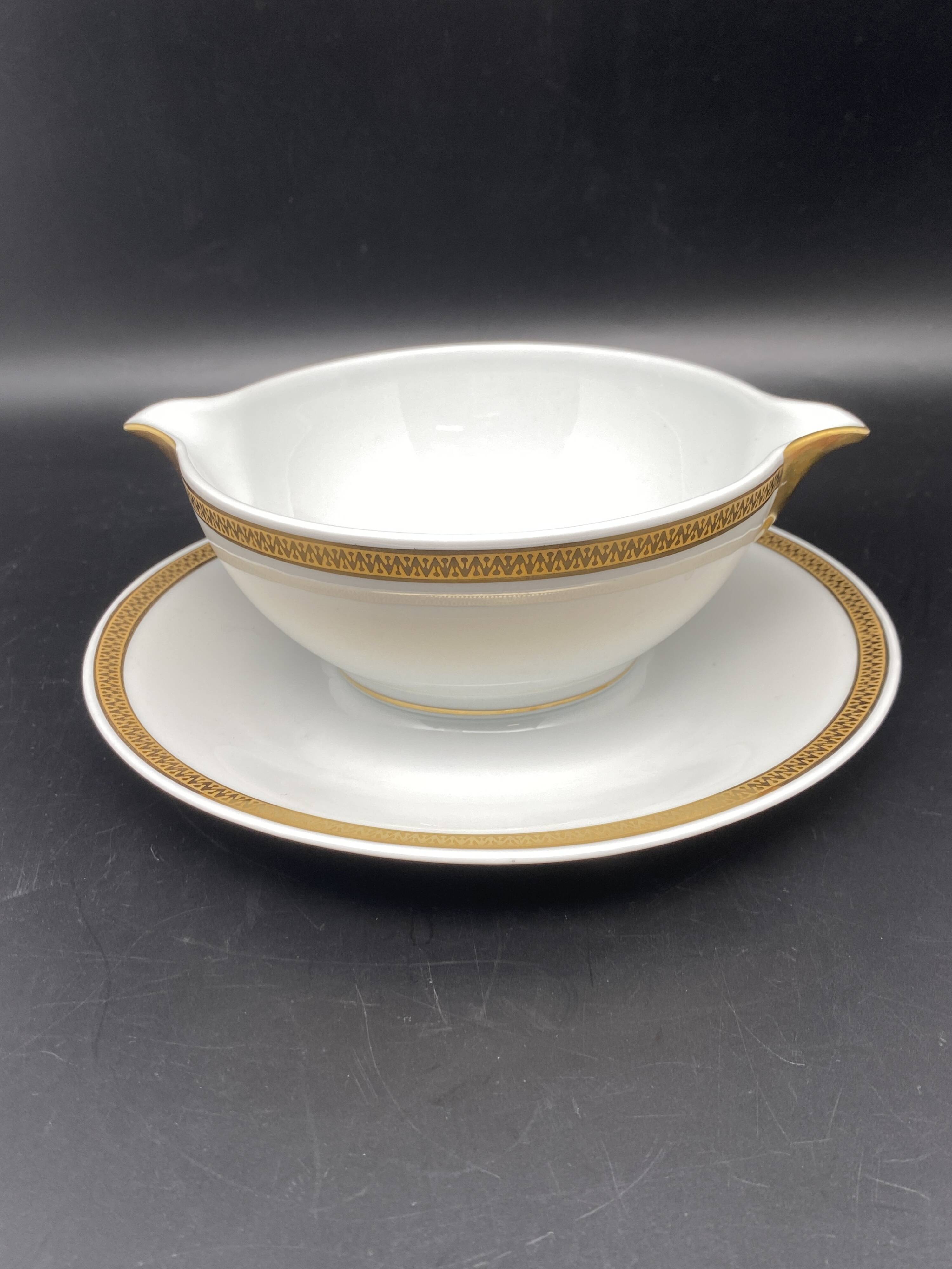 Limoges porcelain gravy boat with gold edging