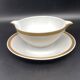Limoges porcelain gravy boat with gold edging