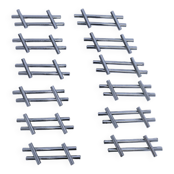 Twelve 70s design metal knife holders