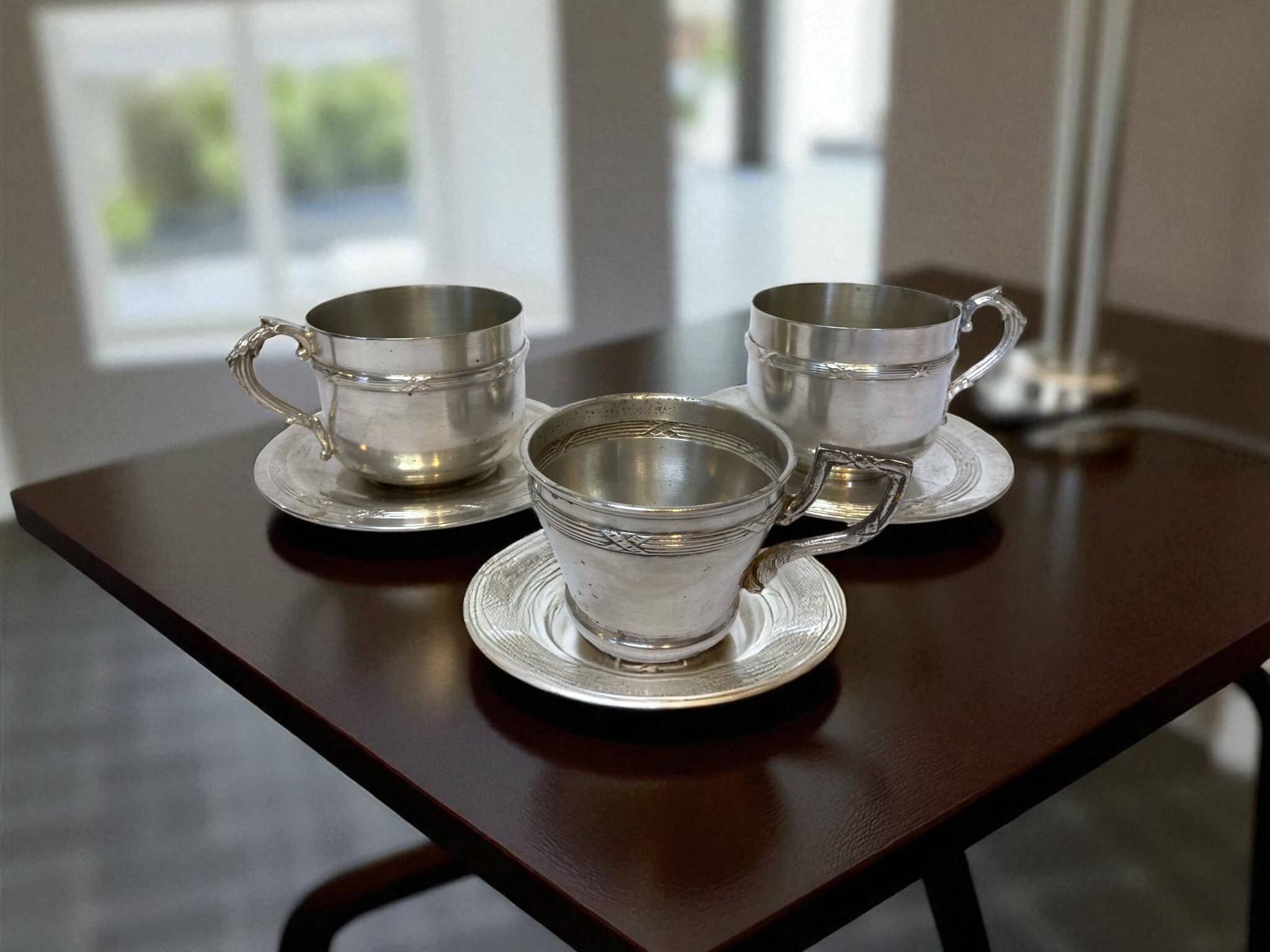 Tableware, set of three silver-plated tea cups, early 20th century