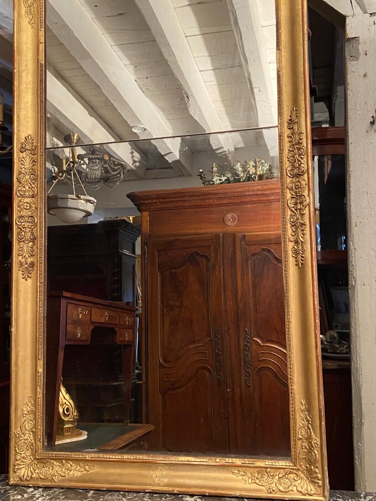 Large mirror fireplace mirror in wood and gilded stucco XIX Restoration