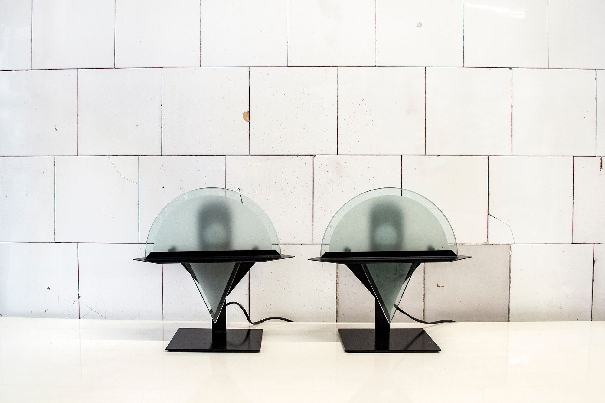 Pair of postmodern lamps with iron structure and lampshade in satin glass Italy 80s