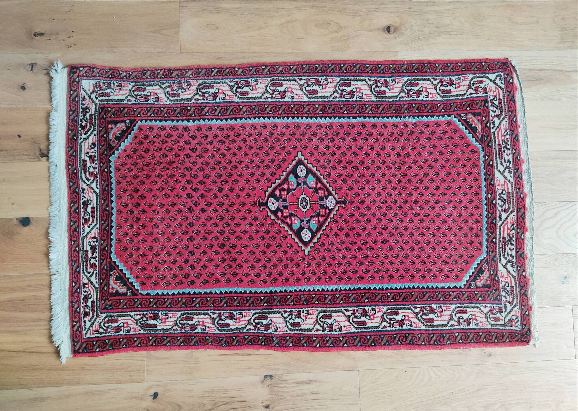 Oriental carpet 79 x 130 cm