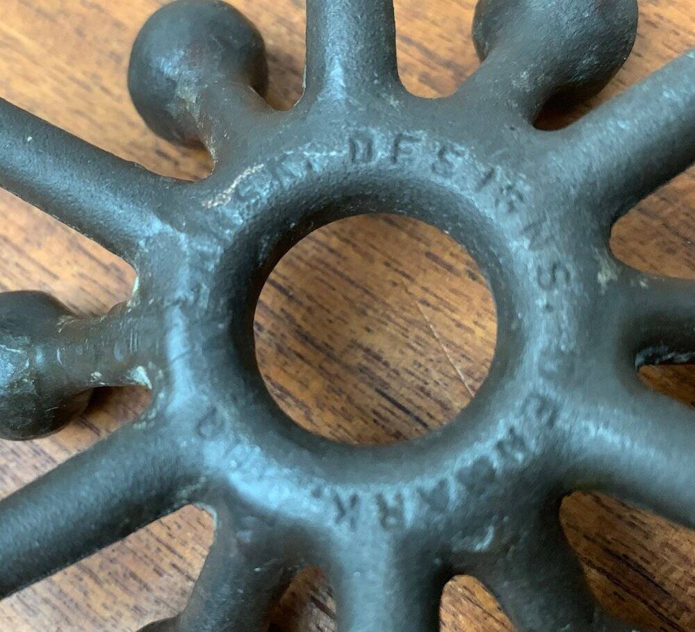 Brutalist Danish candle holder from the mid-century in cast iron by Jens H. Quistgaard.