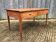 Poplar wood table with 2 front drawers from the Reconstruction period.