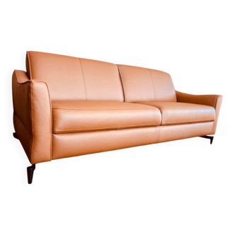 Cognac-colored leather sofa, new condition, never used due to death