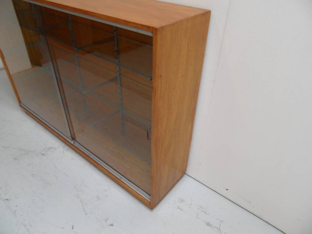 Vintage shop display cabinet with sliding doors