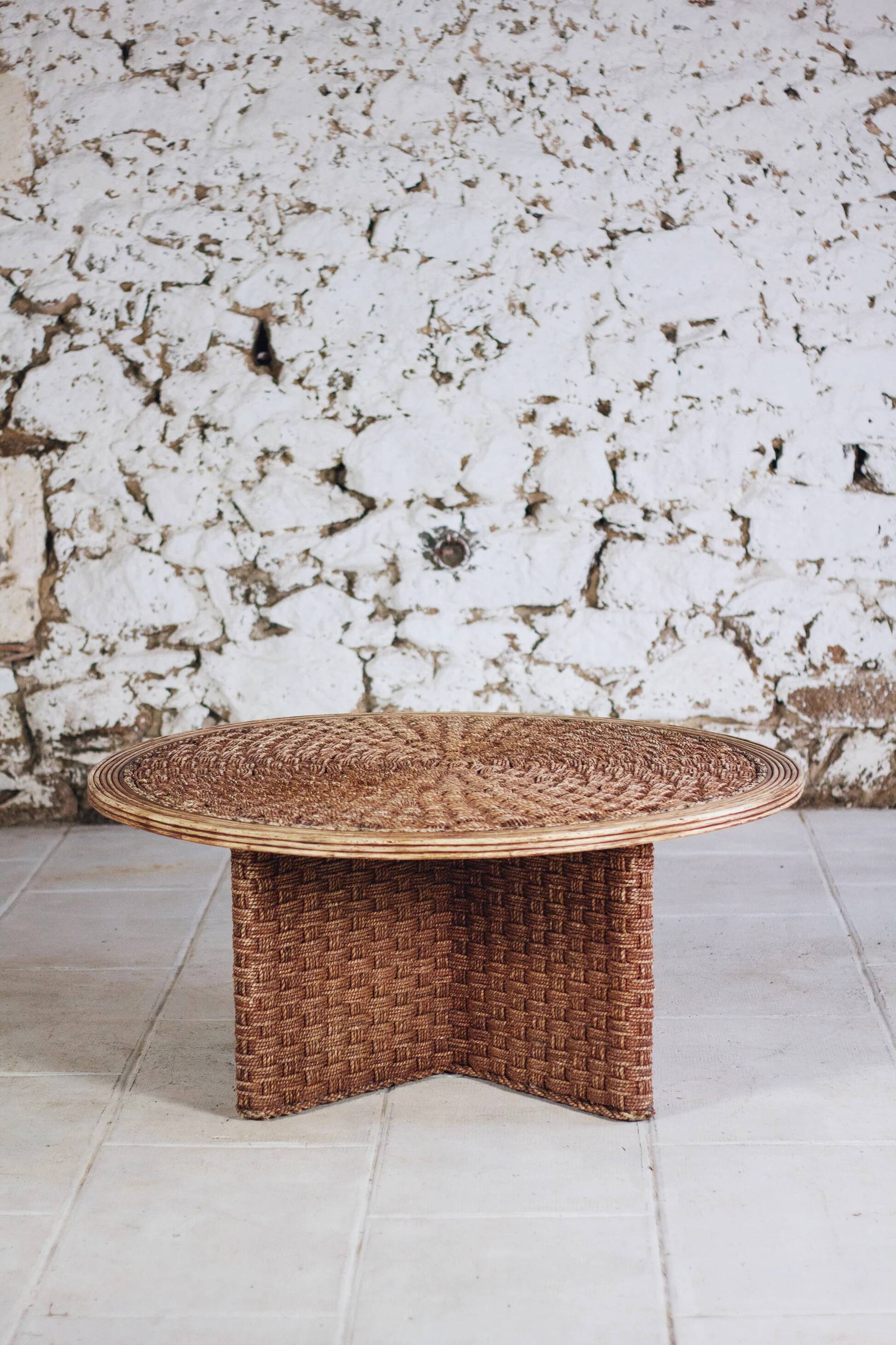 Round coffee table in braided cord and rattan, 1970.