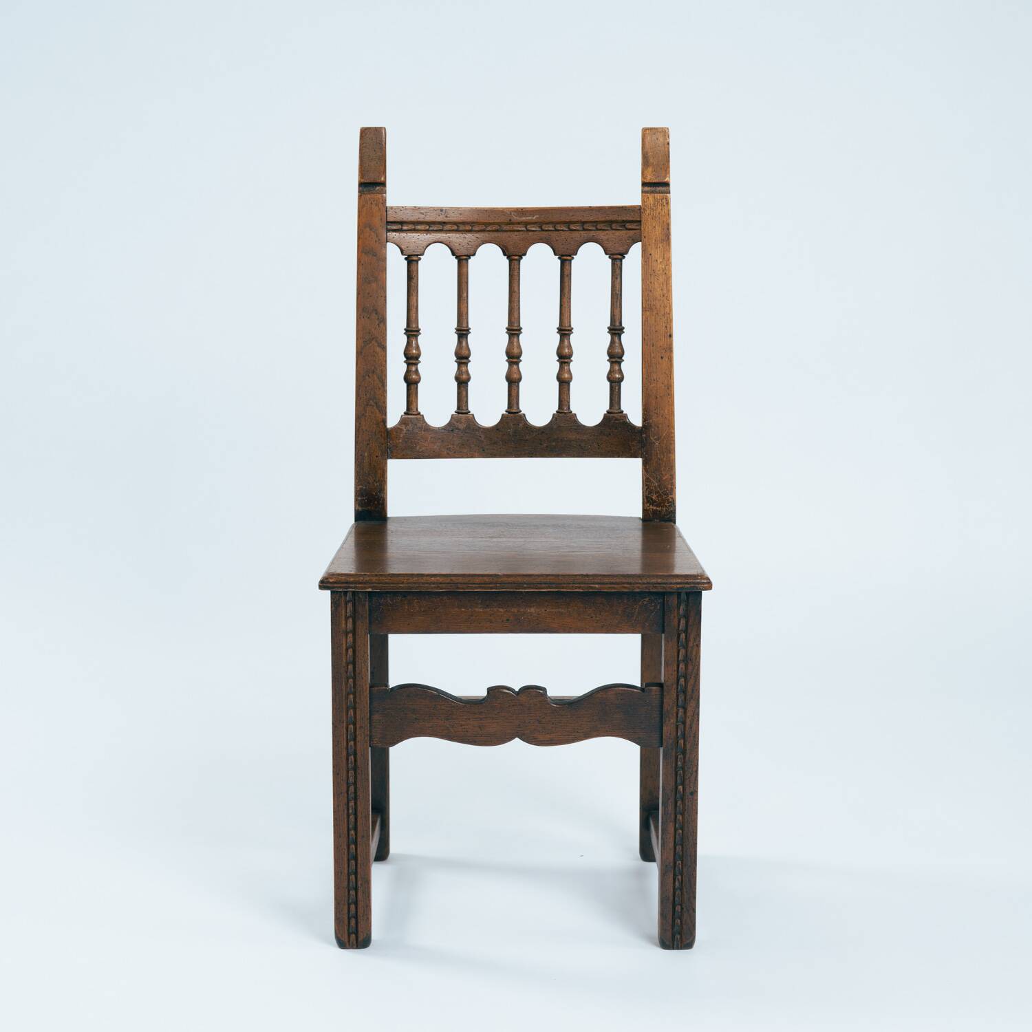 Spanish carved walnut wooden dining chairs, 1970s