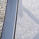 70s design coffee table in black lacquered wood with smoked glass top