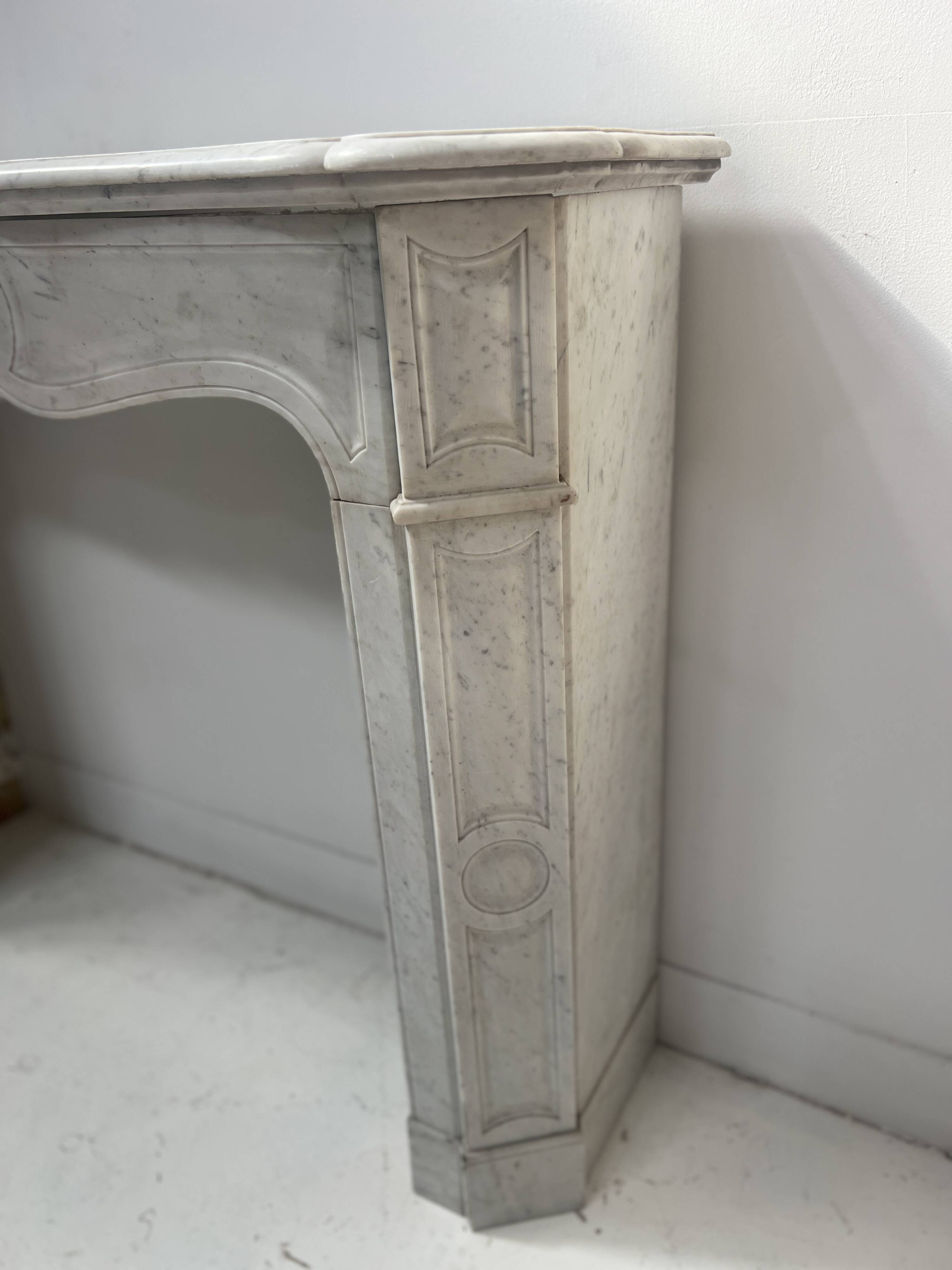Louis XV style fireplace Model Pompadour White Carrara marble 20th century