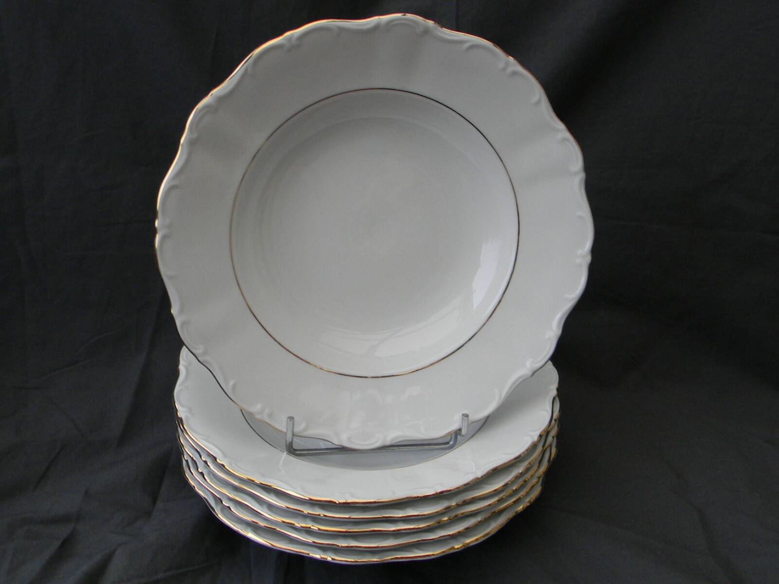 Set of 6 deep porcelain plates. Germany BAVARIA. Gold rim.