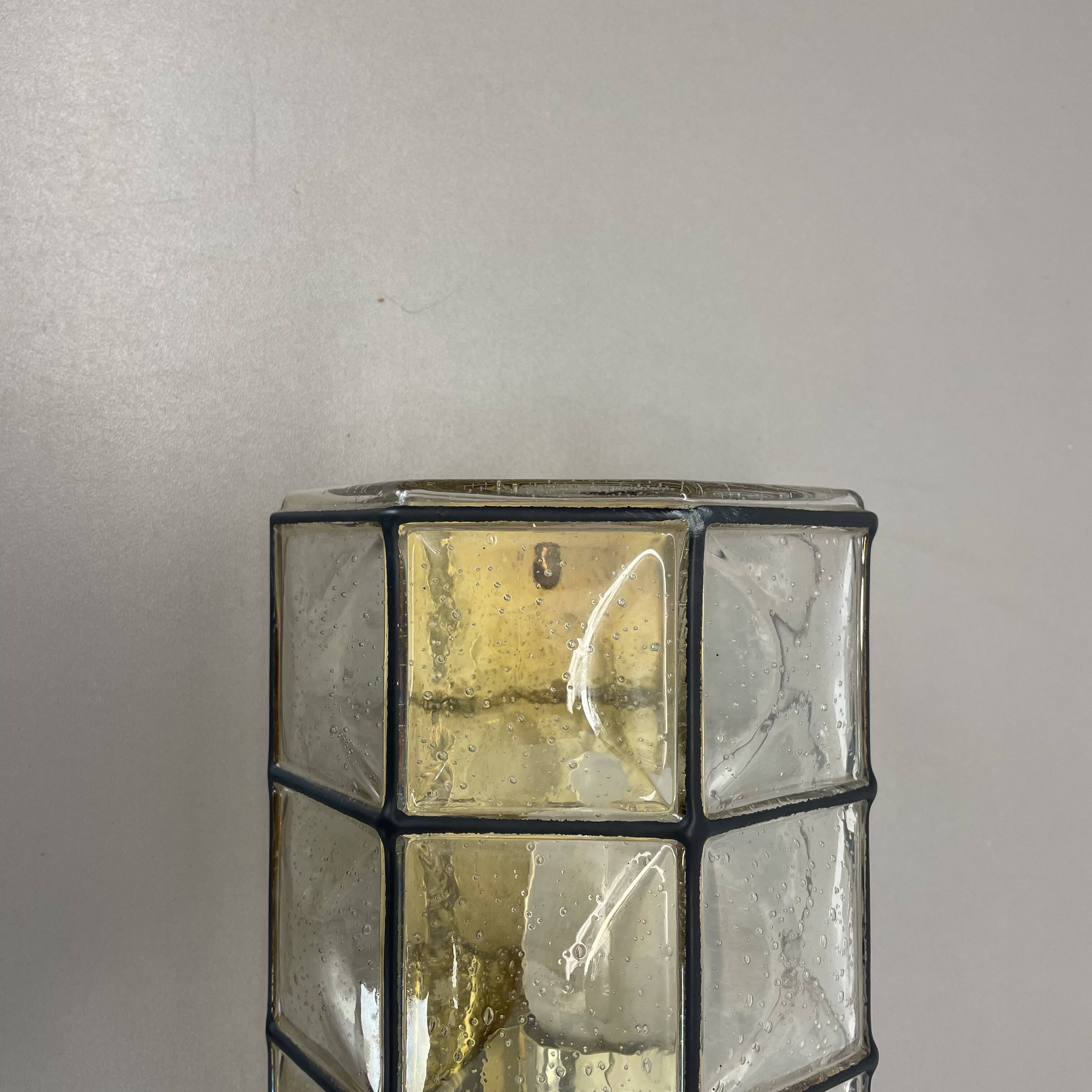 Wall light "Iron Rings" in brass and glass by Glashütte Limburg, Germany, 1970s