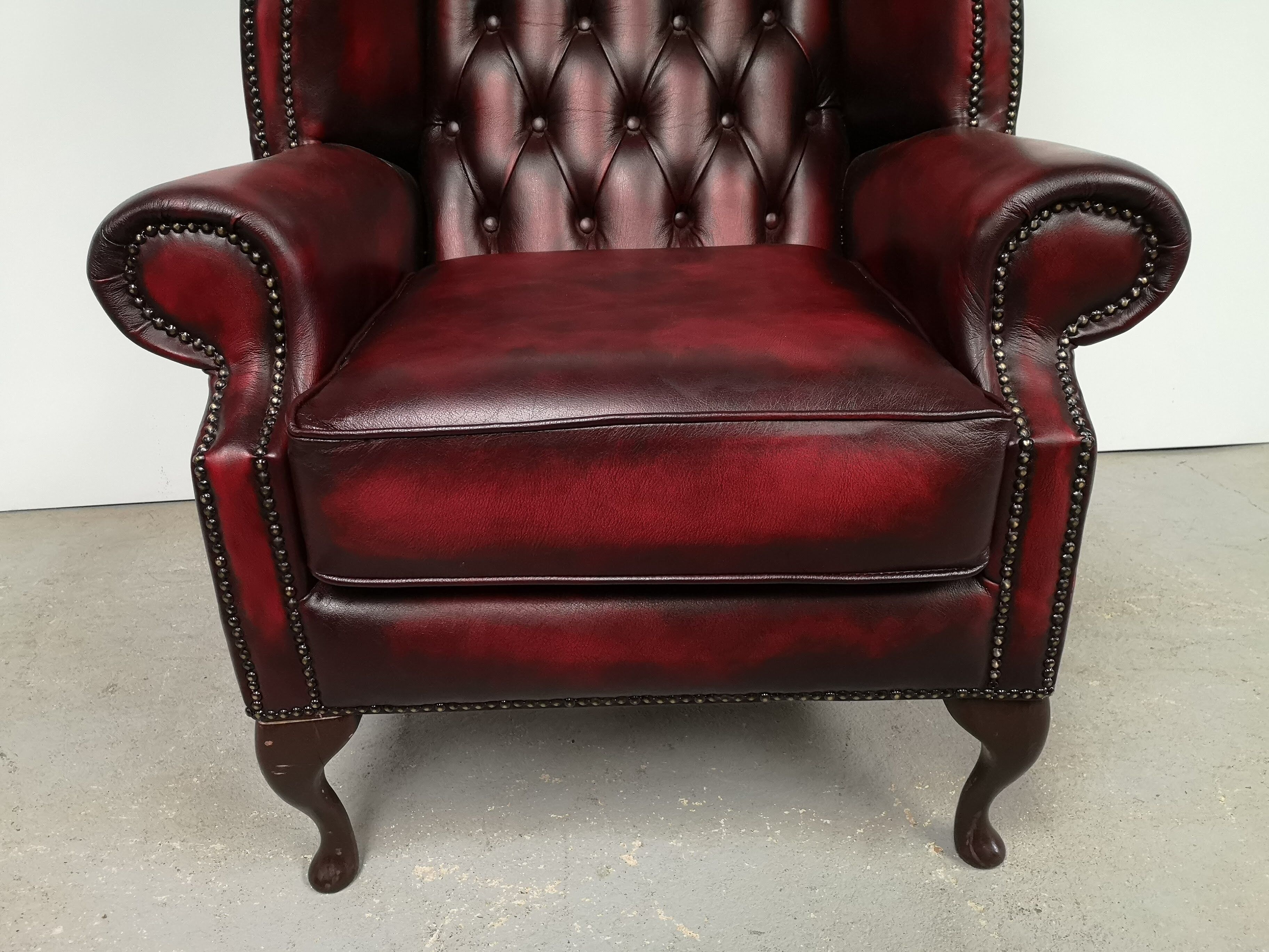 Burgundy chesterfield chair