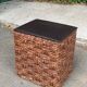 2 Scandinavian poufs in woven brown water hyacinth and leather