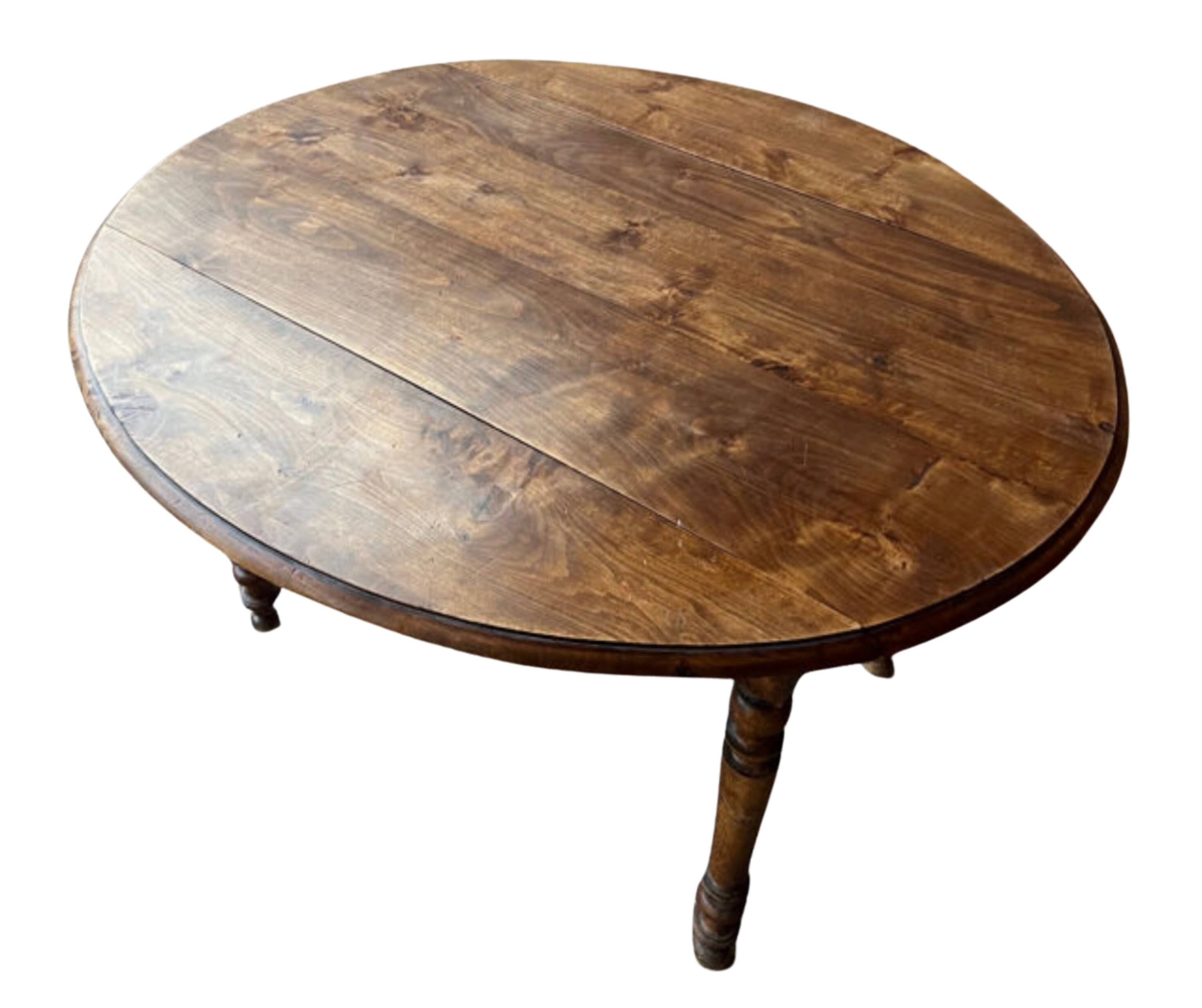 Round (foldable) table in solid wood (walnut)