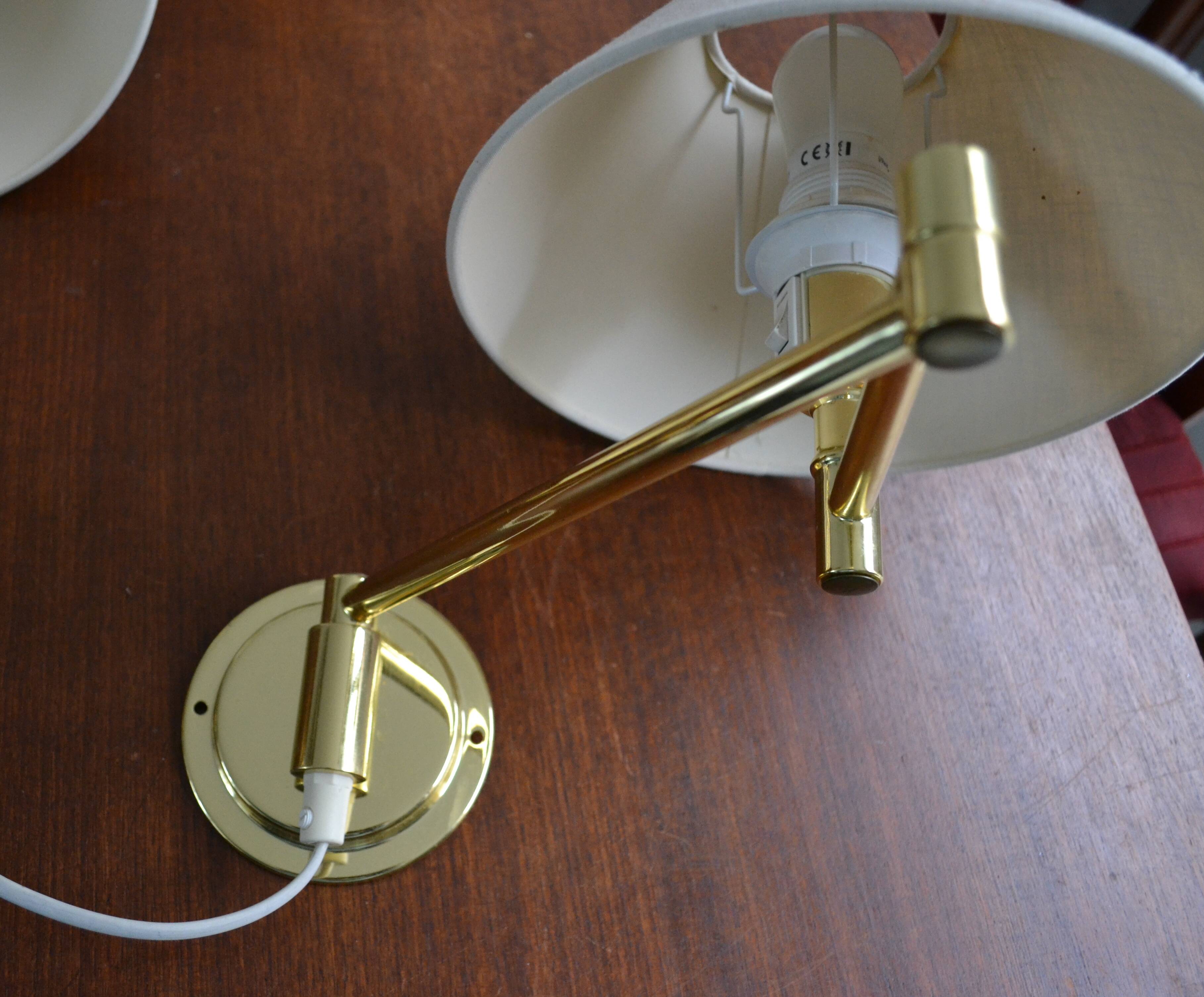 Pair of vintage gold articulated sconces