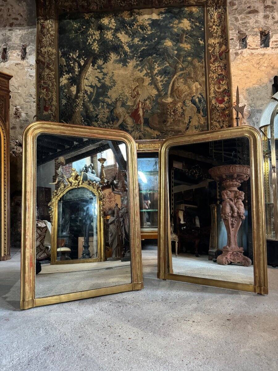 Pair of Louis Philippe period mirrors in gilded wood 1.30m x 89cm