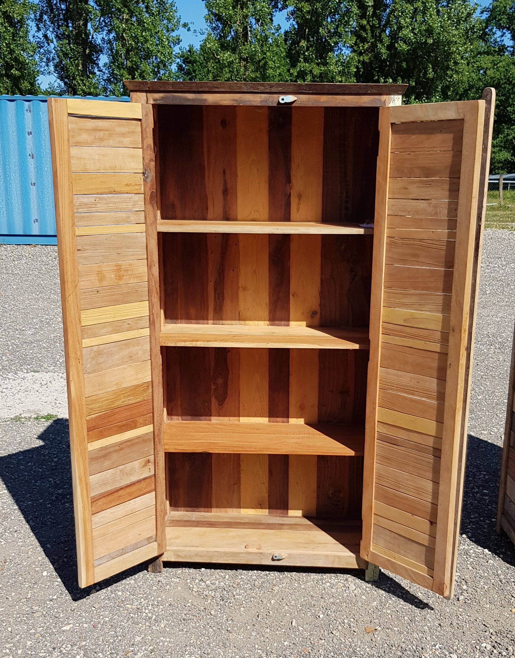 Bookcase - cabinet in colored wooden slats