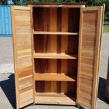 Bookcase - cabinet in colored wooden slats