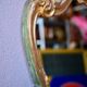 Baroque gold table mirror in Louis XV style, carved and stuccoed wood.