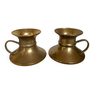 Pair of rat cave candlesticks with tulip base in bronze.