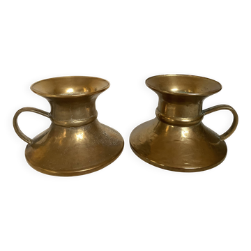 Pair of rat cave candlesticks with tulip base in bronze.