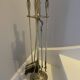 Brass fireplace servant and its 4 accessories