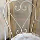 Fauteuil de jardin en fer forgé blanc