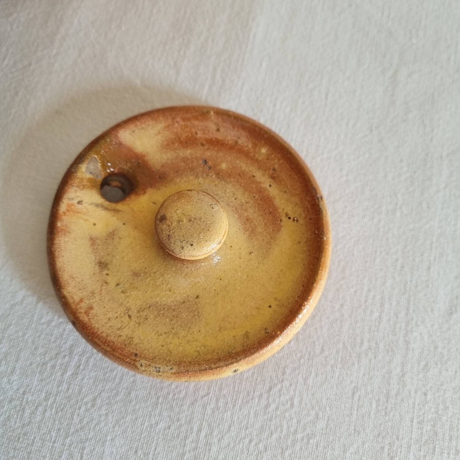 Glazed terracotta jug with lid