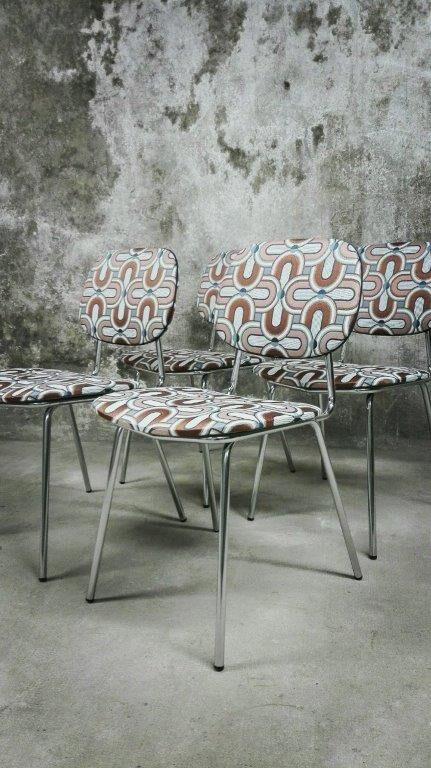 Series of four vintage italian chairs in chrome steel