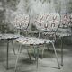 Series of four vintage italian chairs in chrome steel