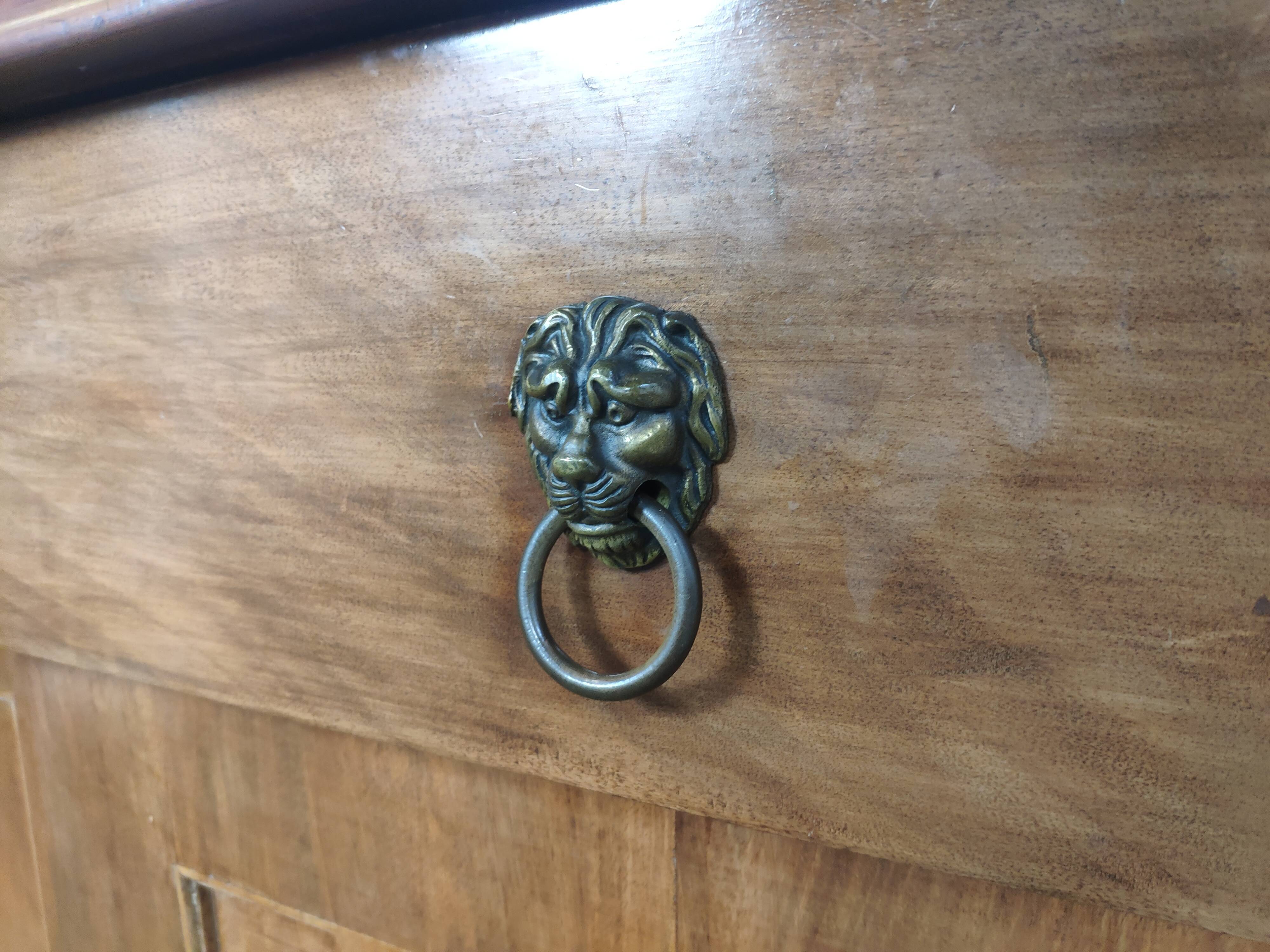 Walnut 4-door lion head sideboard