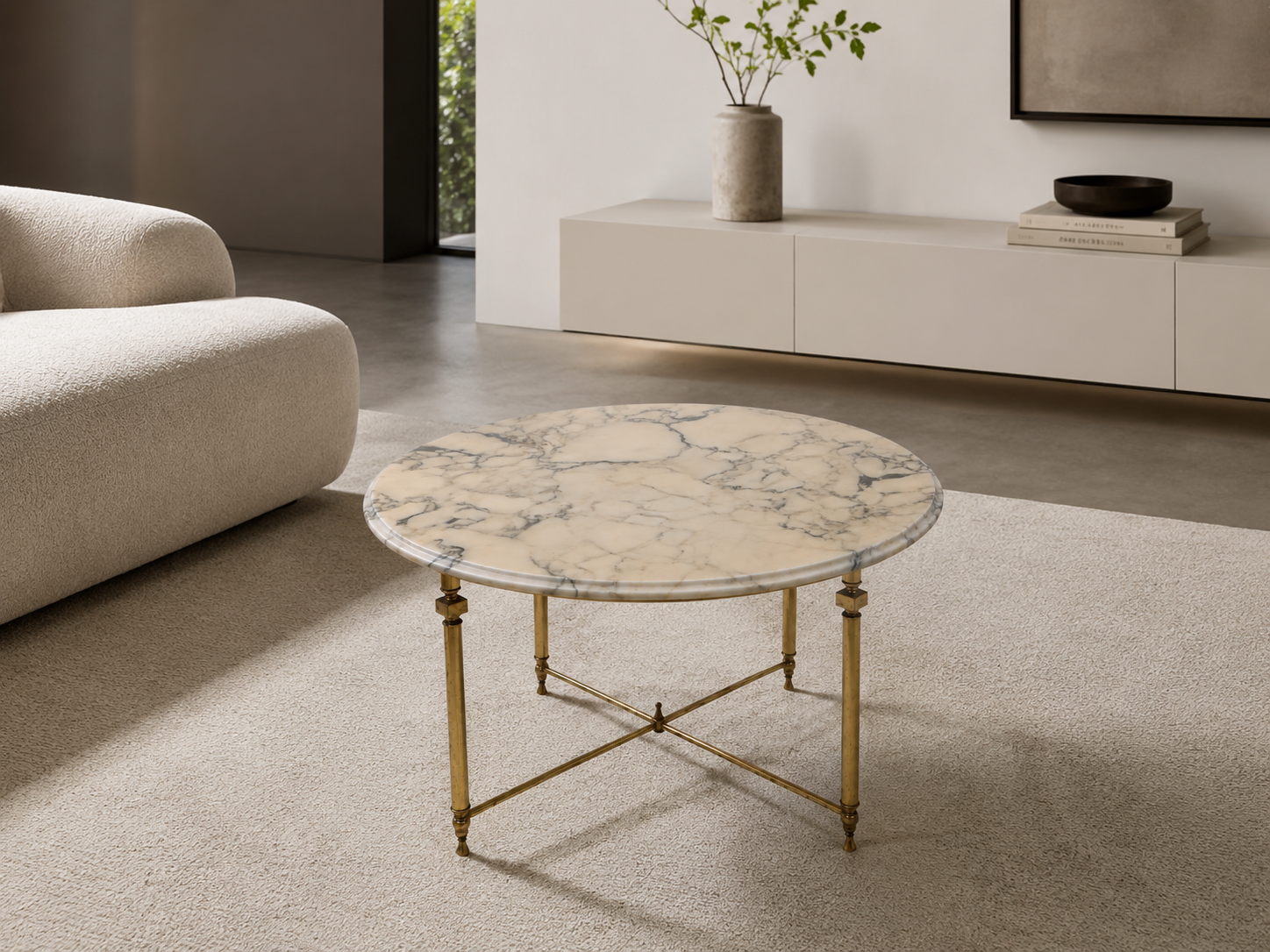 Round marble coffee table with brass base