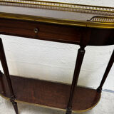 Louis XVI demi-moon console in wood and brass.