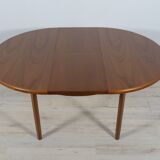Round extendable dining table from McIntosh, 1960s
